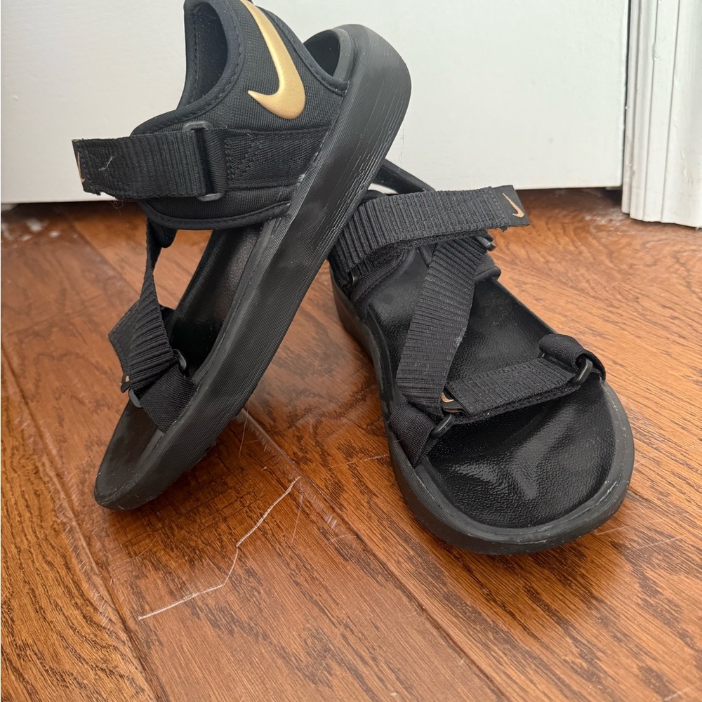 Nike Womens Black Sandals with Gold Accent